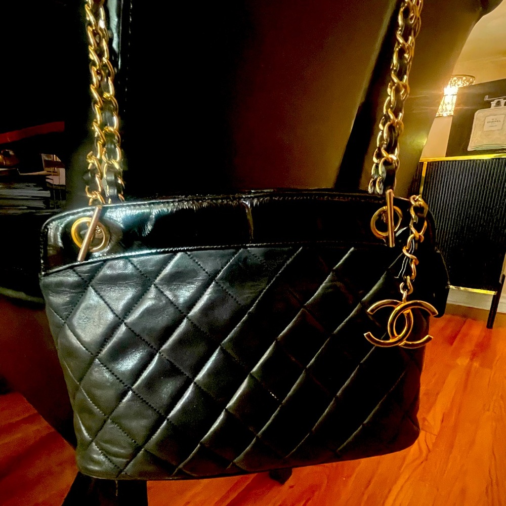 Black Chanel Chain Shoulder Bag. H8”xL11”xD3”. Shoulder drop 20”.